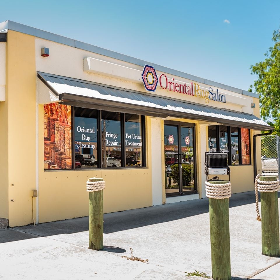The Oriental Rug Salon storefront on Country Club Blvd in Cape Coral, with the logo sign and window lettering